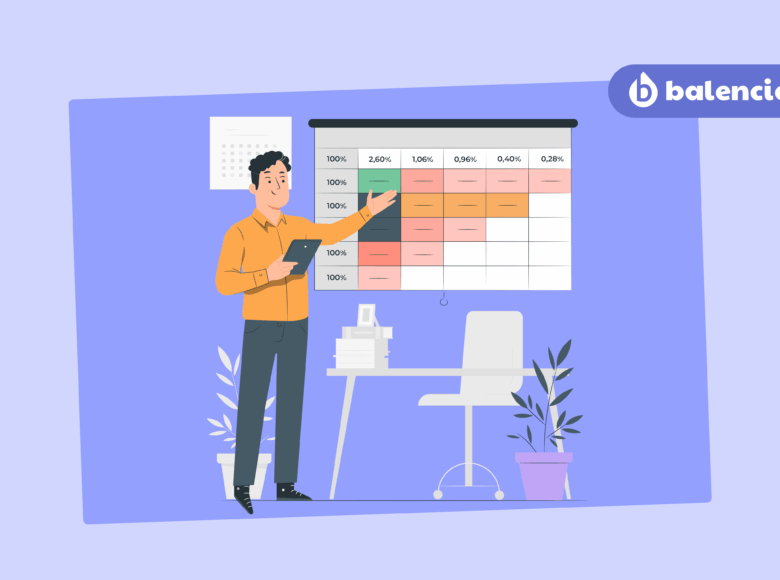 **Texte alternatif SEO :** Employés au bureau discutant avec leur manager autour d’un poste de travail vide, illustrant l’absentéisme au travail et les solutions de prévention mises en place par l’entreprise.